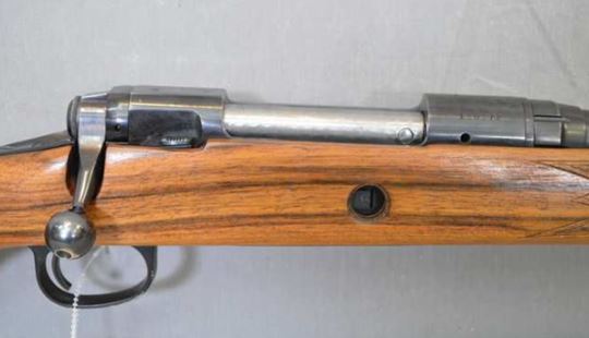 The receiver of CIL 950C, chambered for .243 Win.