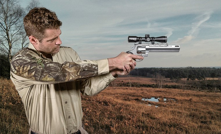 A handgun scope mounted on a revolver - black matte optics